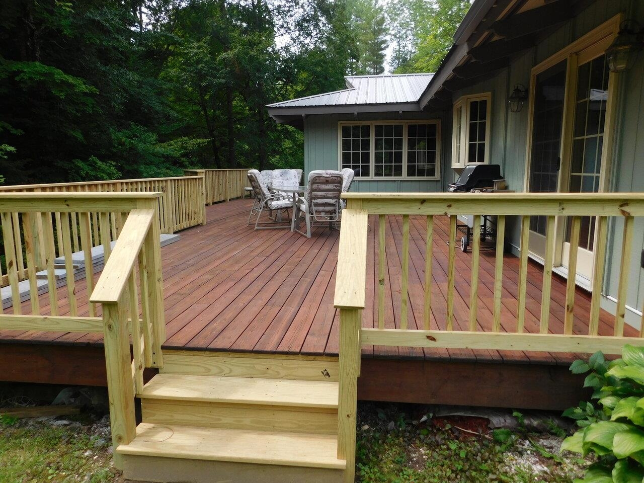 Deck w/ fresh Stain and Rails