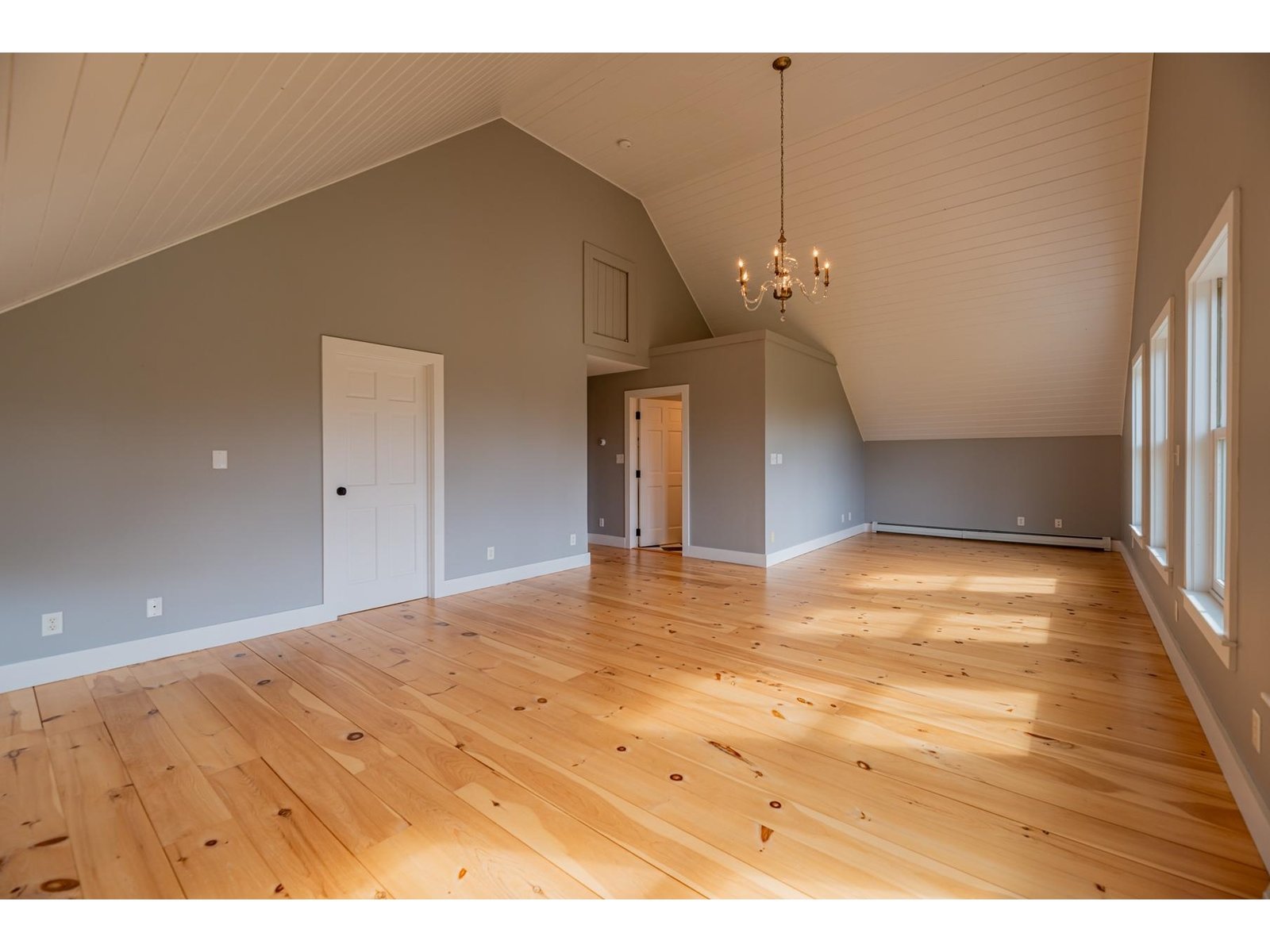 Primary Bedroom with vaulted ceiling & private bath