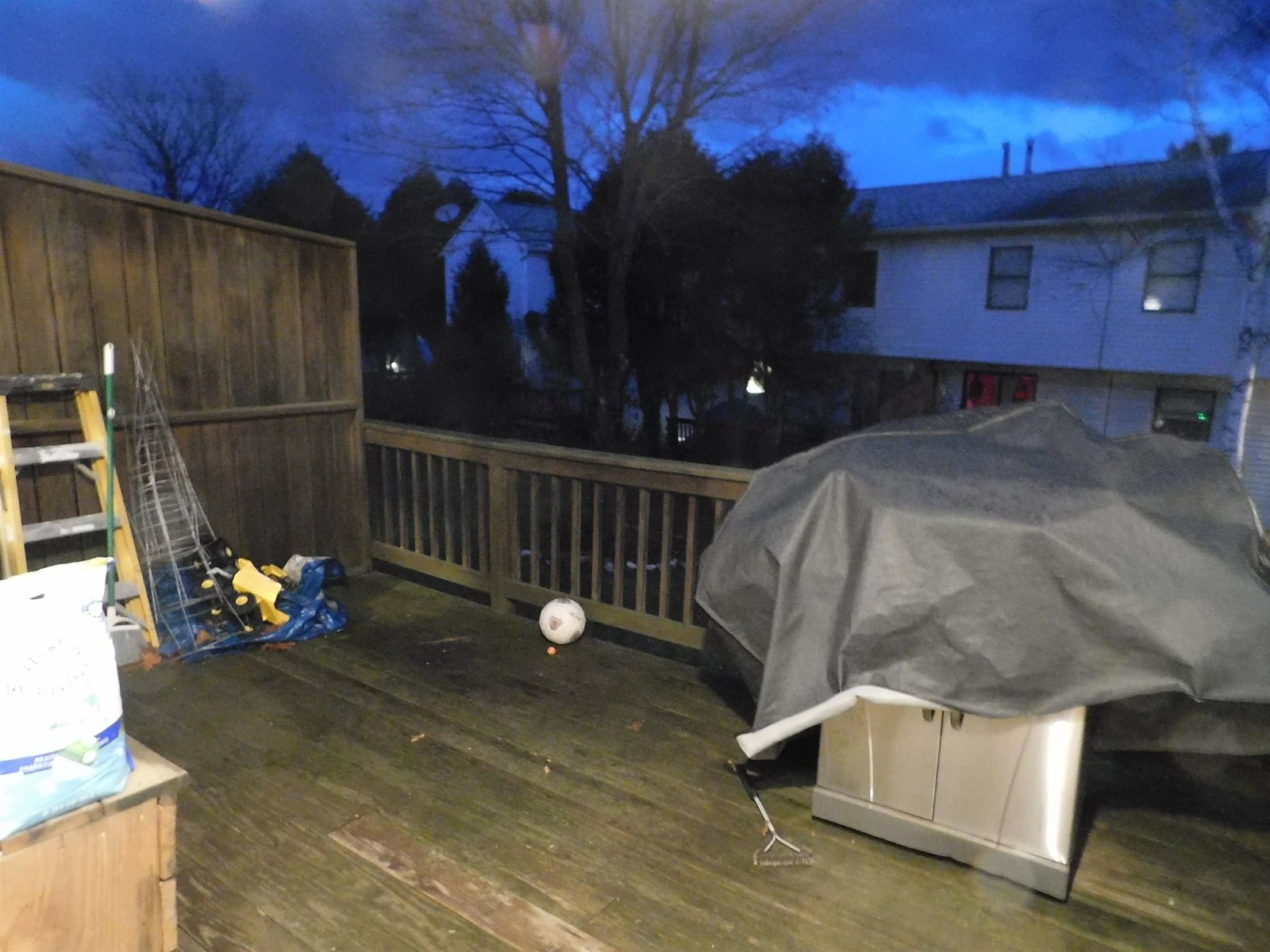 Large wooden deck overlooking the common area.