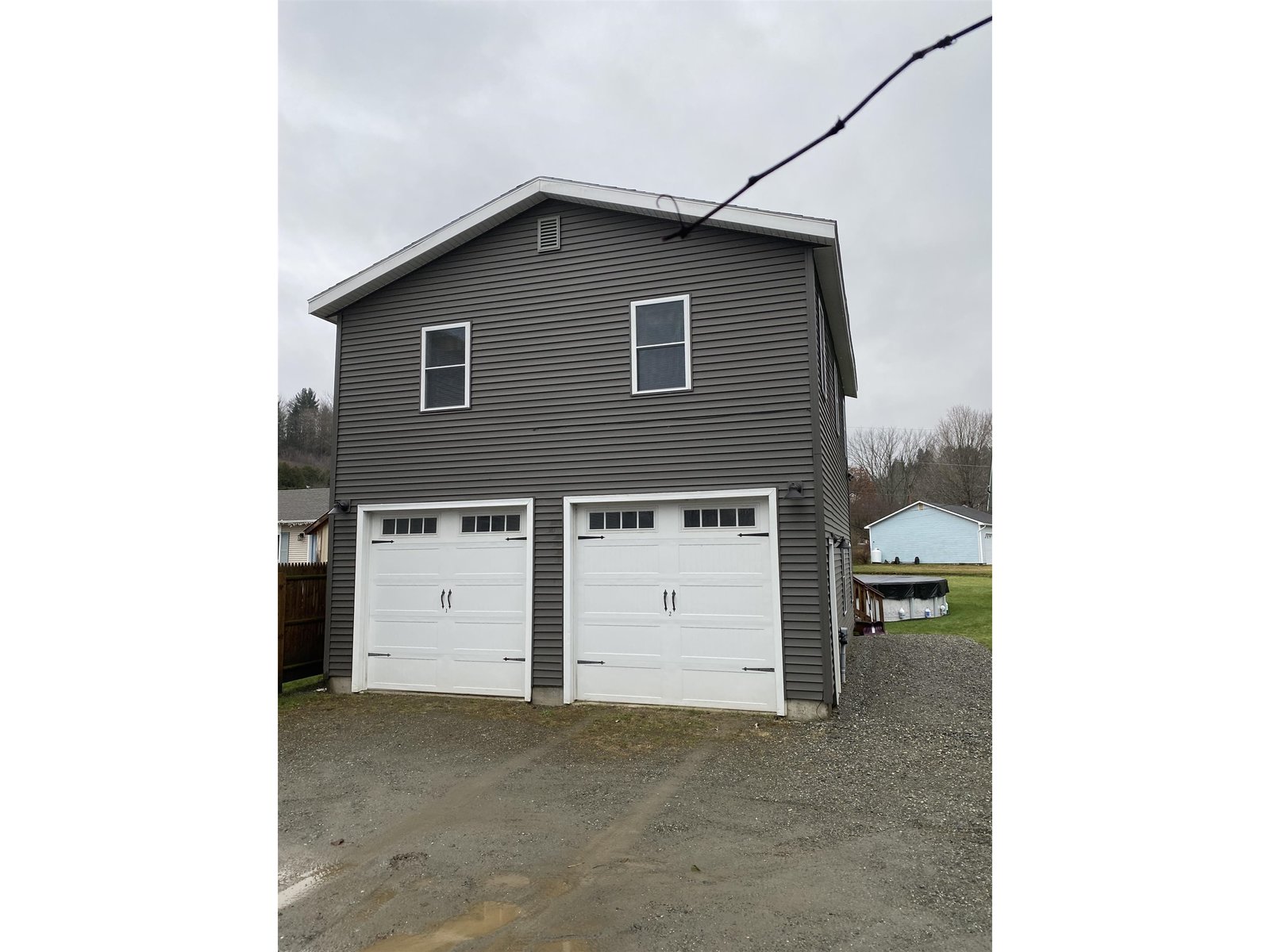 Expansive Two Car Garage with Studio Apartment Upstairs