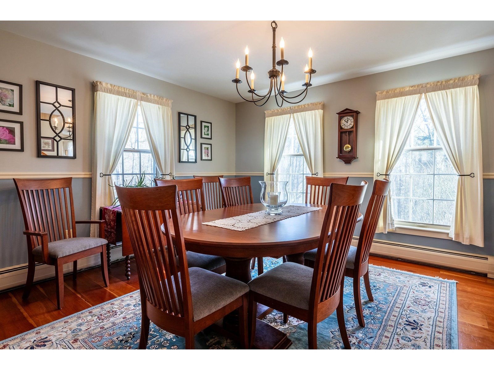 Spacious dining room with cherry wood floors