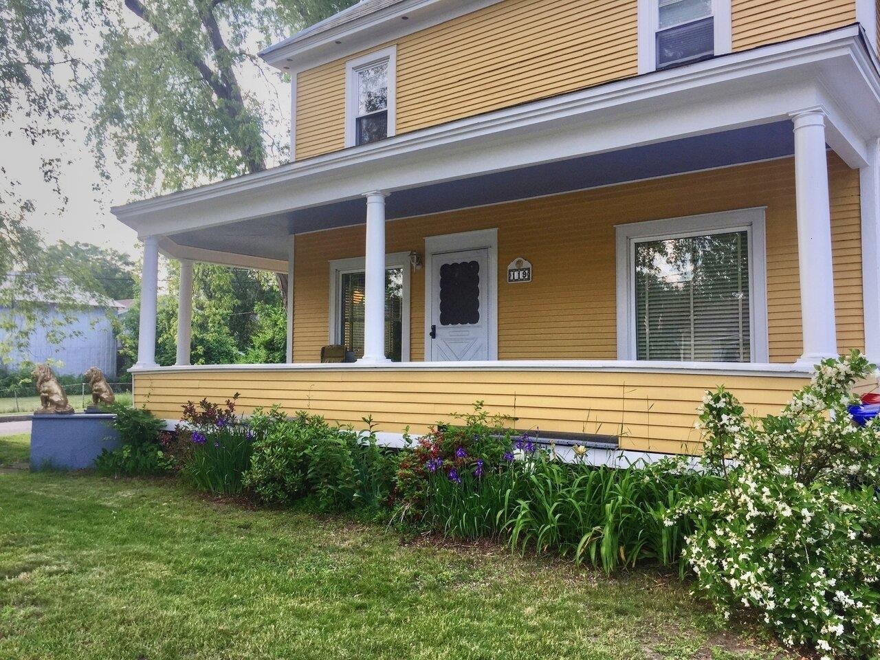 Great front porch & perennials