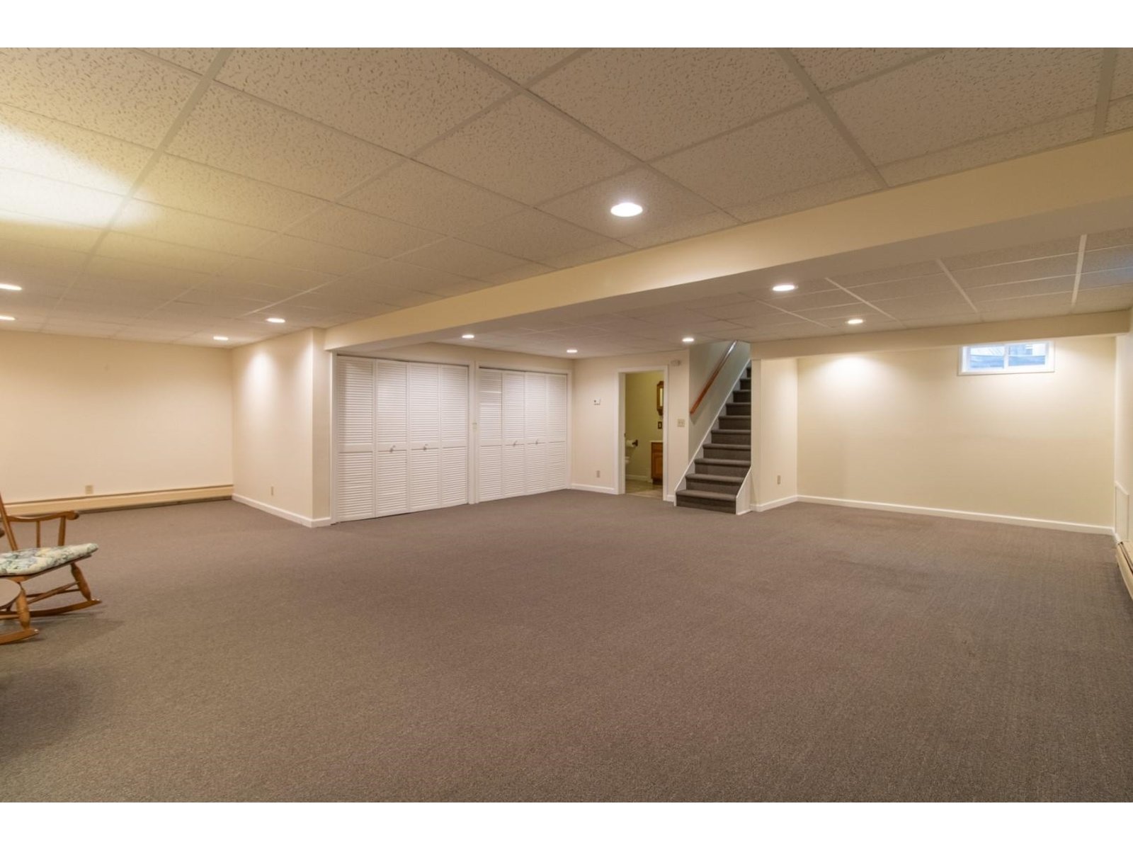 Large open fnished basement with storage and 3/4 bath