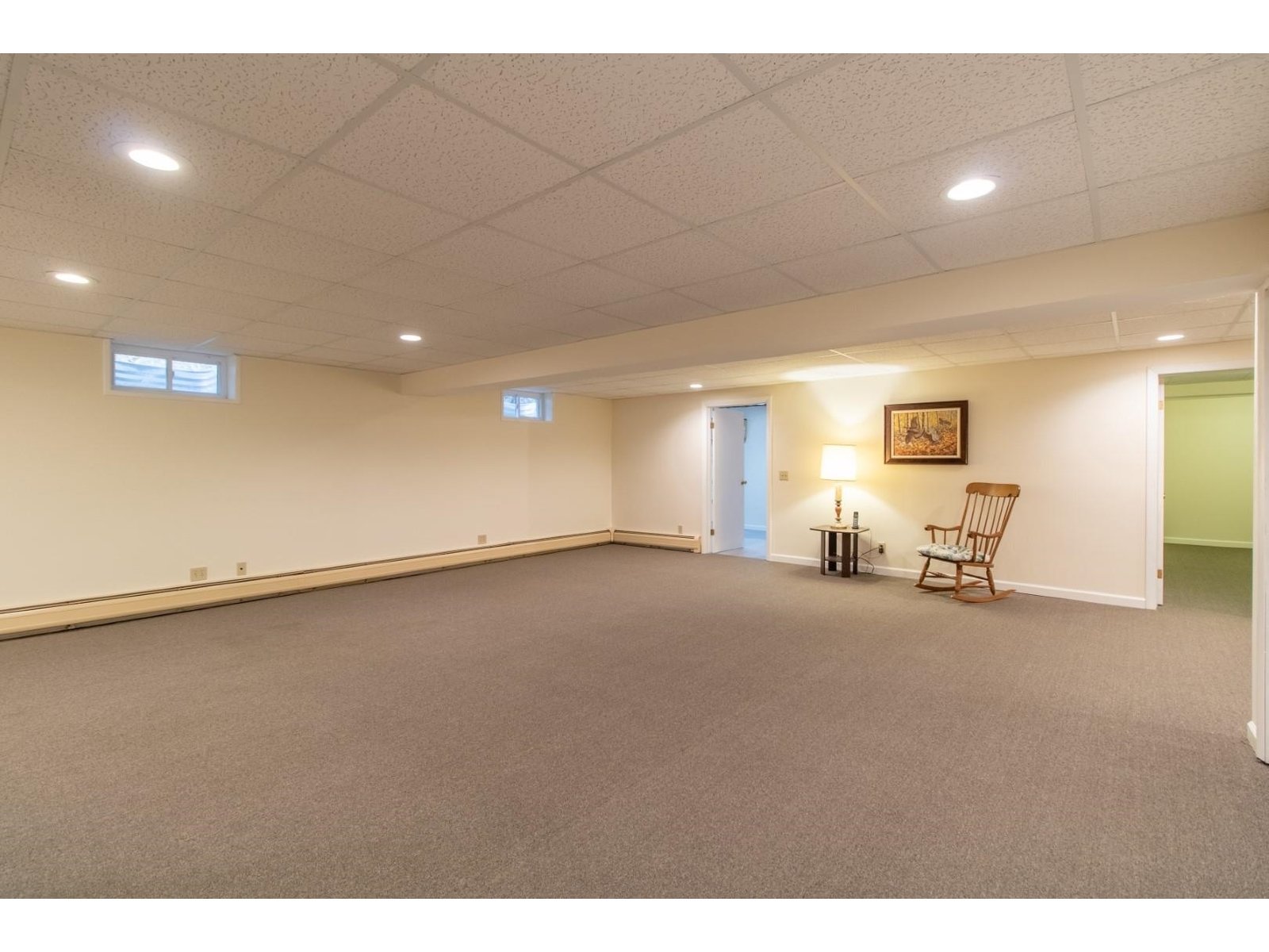 Large open fnished basement with storage and 3/4 bath