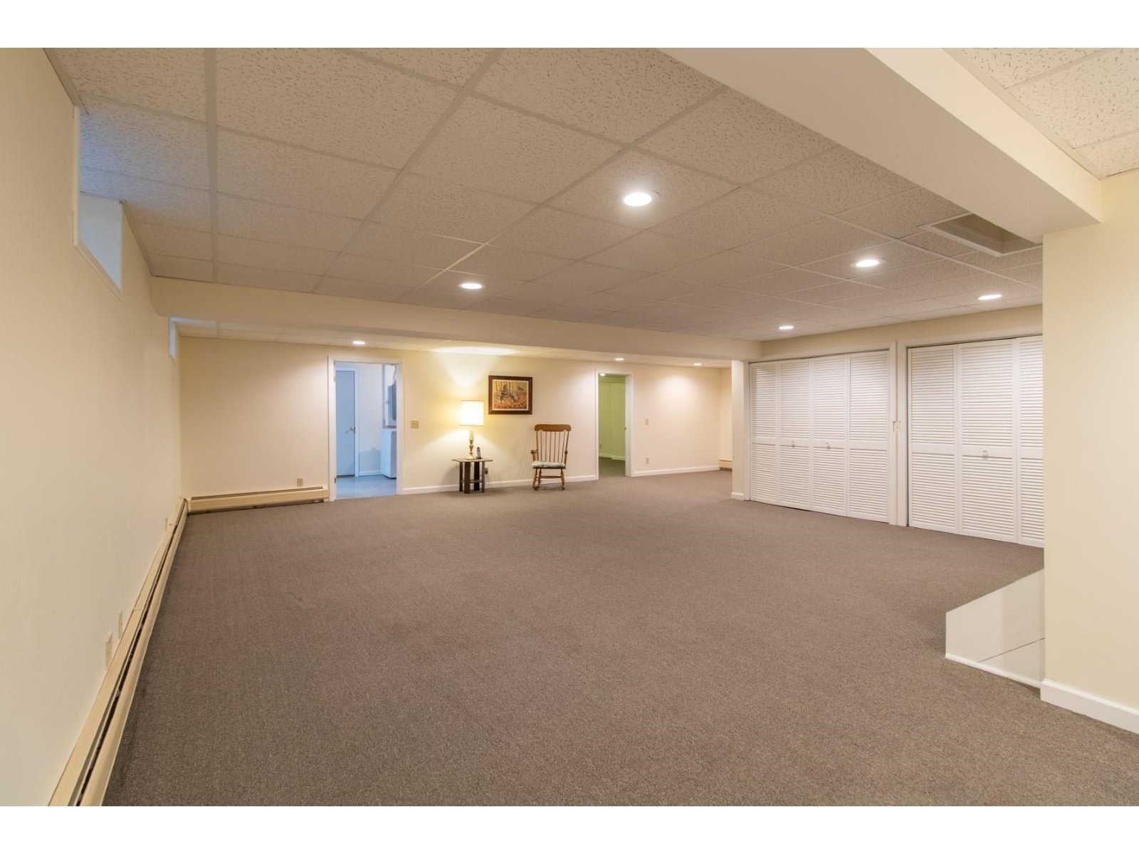 Large open fnished basement with storage and 3/4 bath