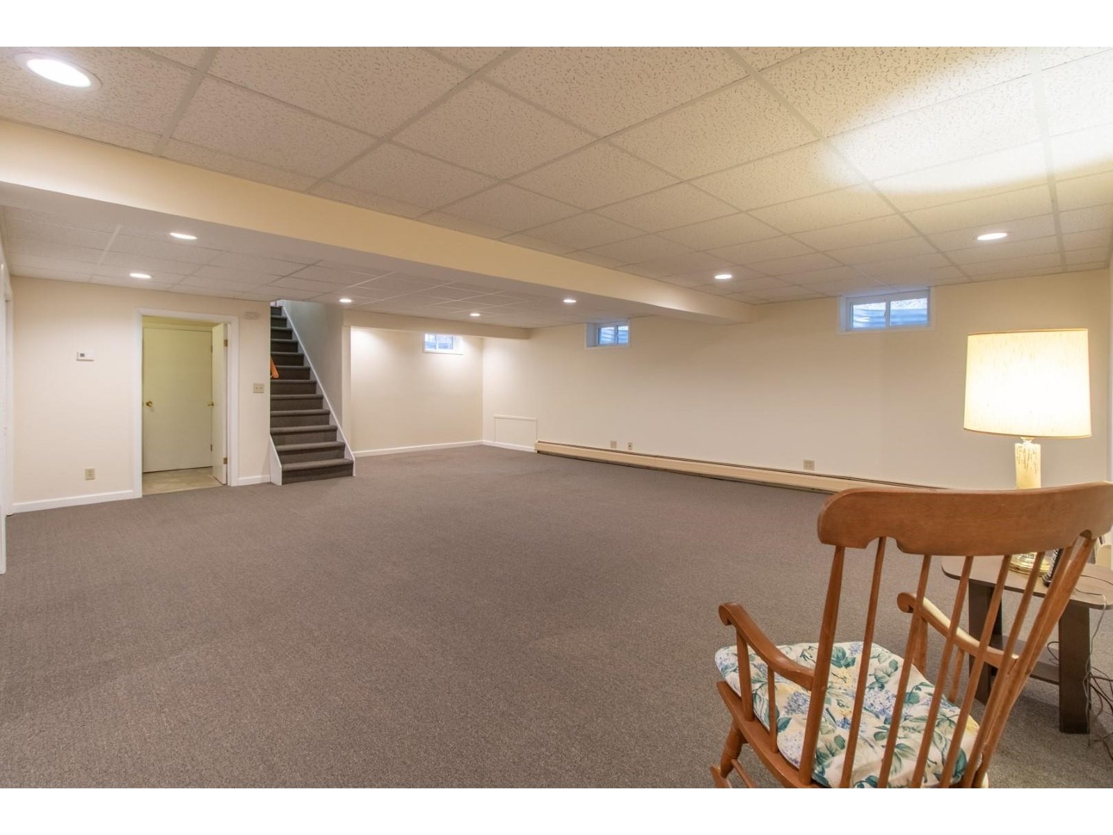 Large open fnished basement with storage and 3/4 bath