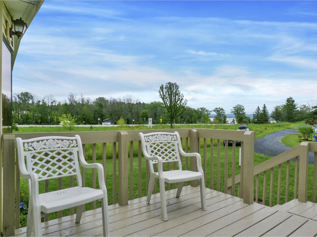 Pretty lake facing front deck!