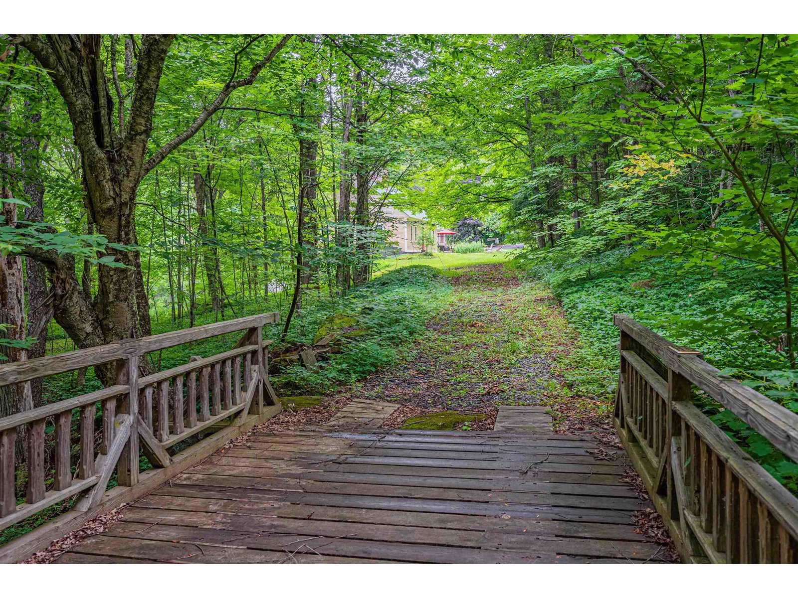 Wide Foot Bridge Over Stream