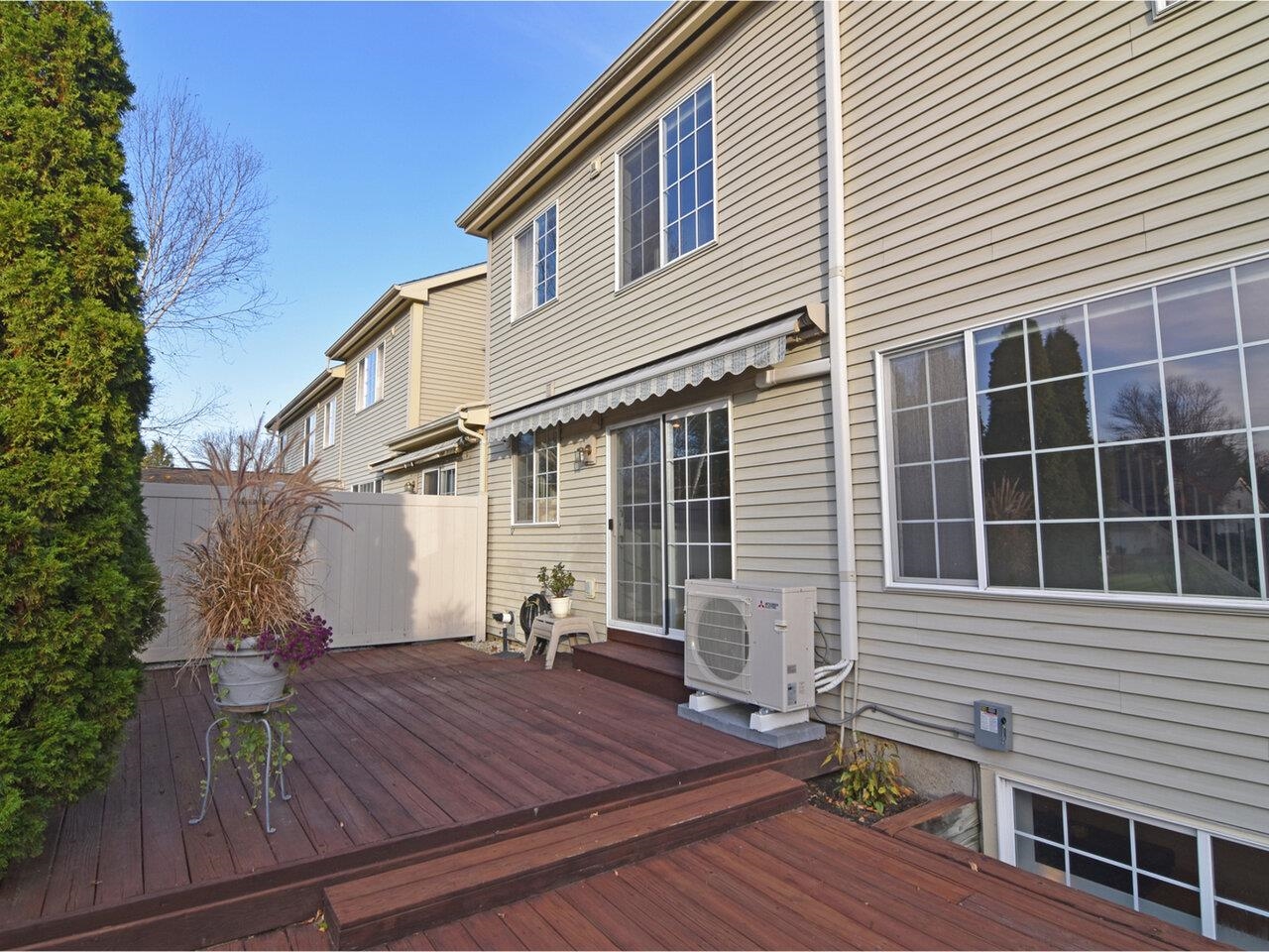 Back deck with privacy hedges