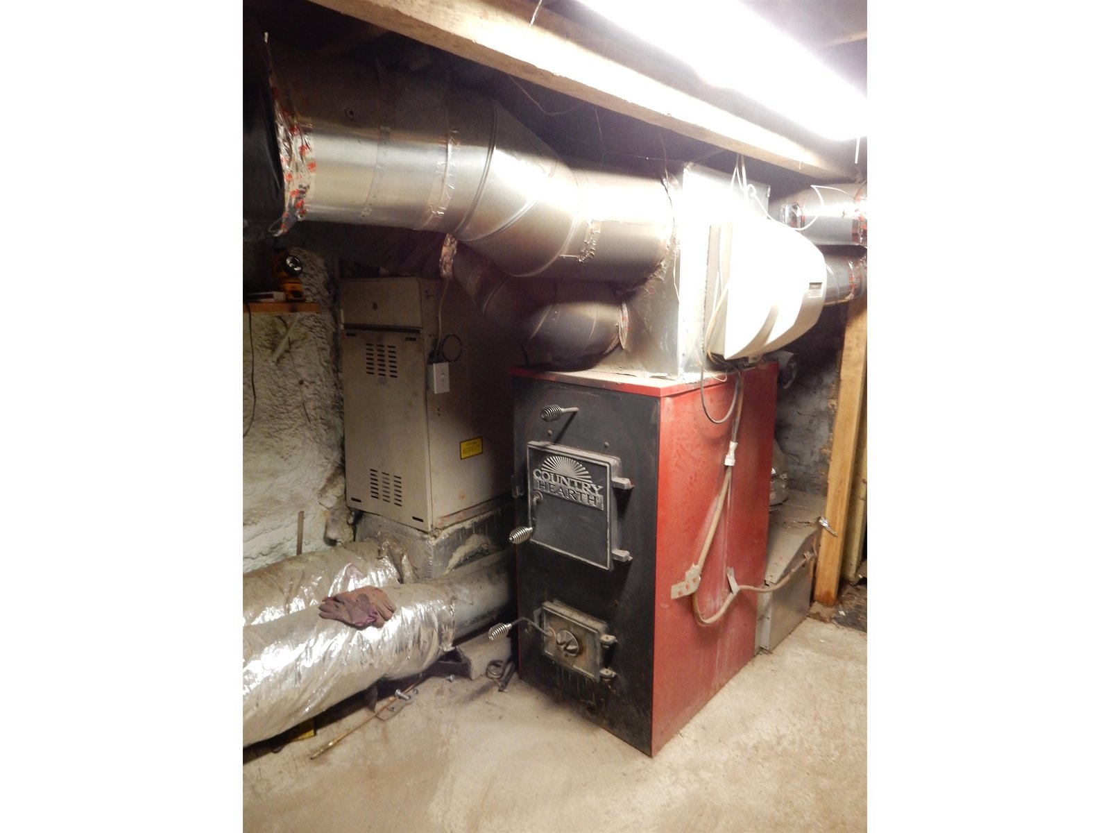 Propand direct vented and wood furnace separate chimney