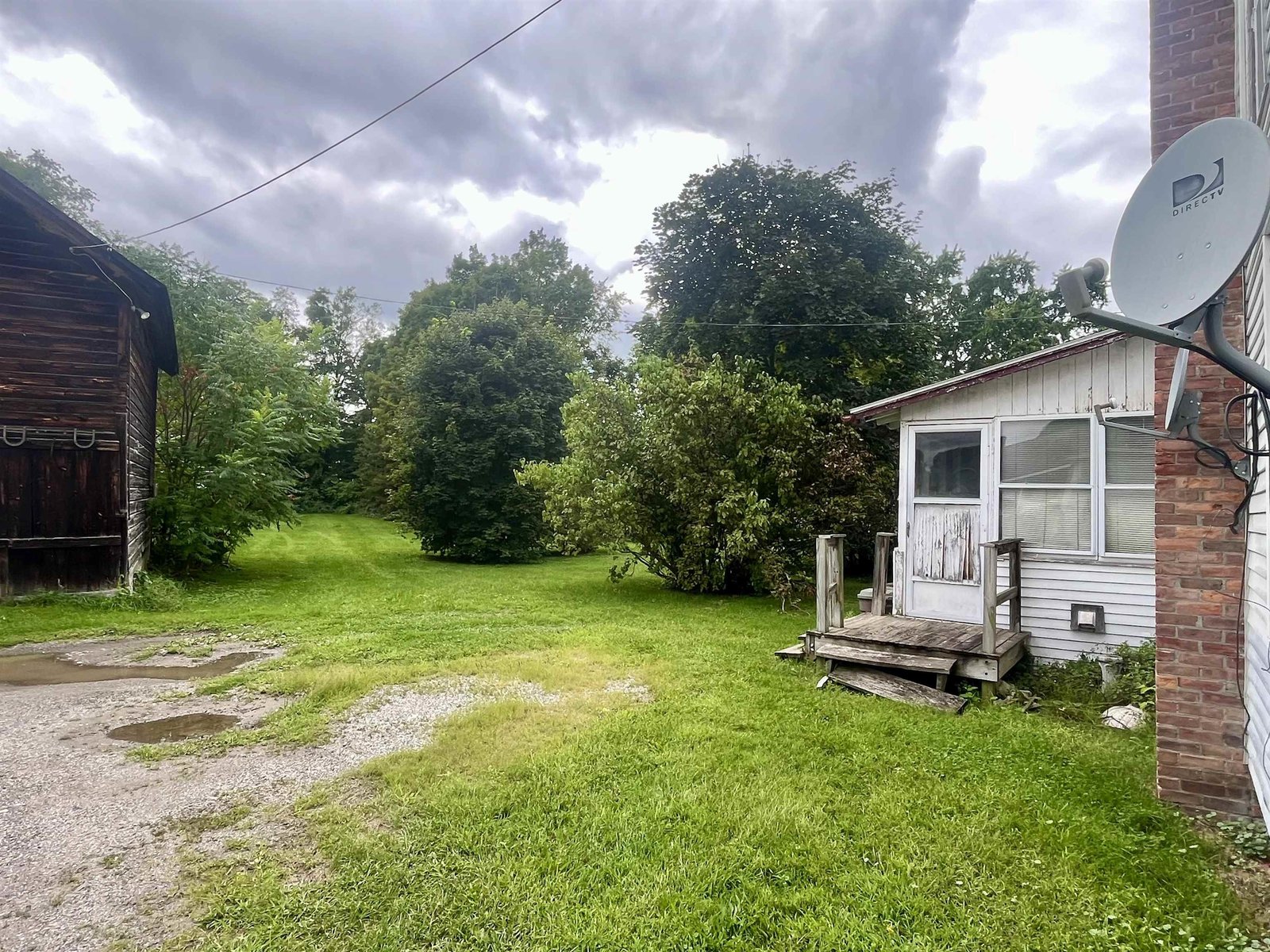 Private parking area, beautiful back yard and enclosed back porch