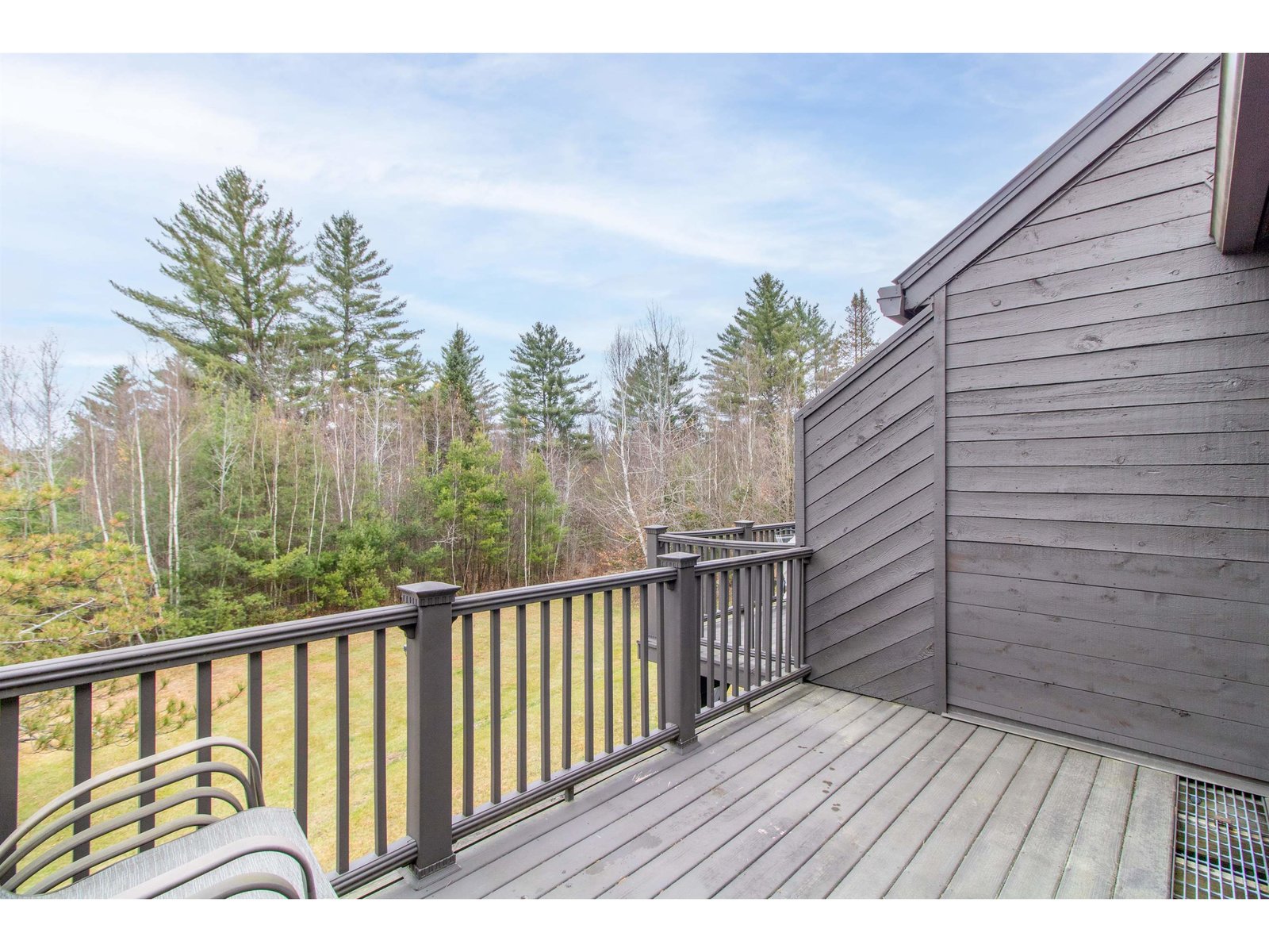 Deck overlooking the pleasant backyard