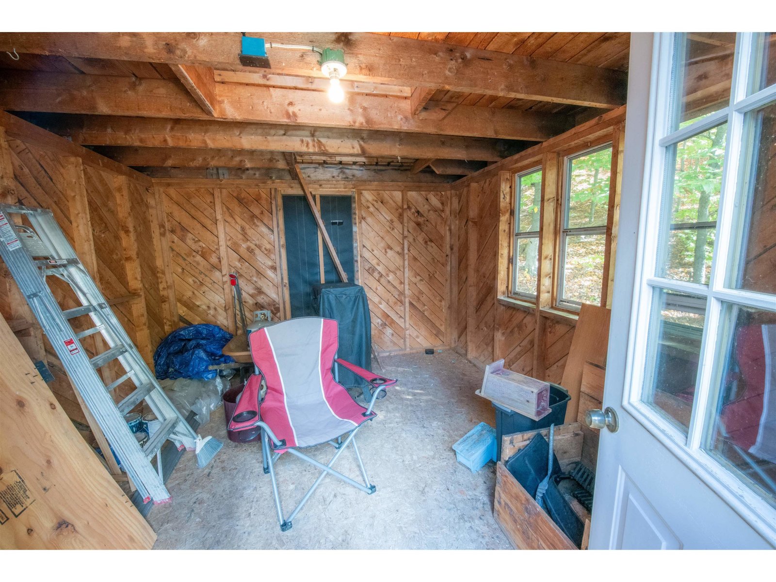 Storage shed off the entry deck