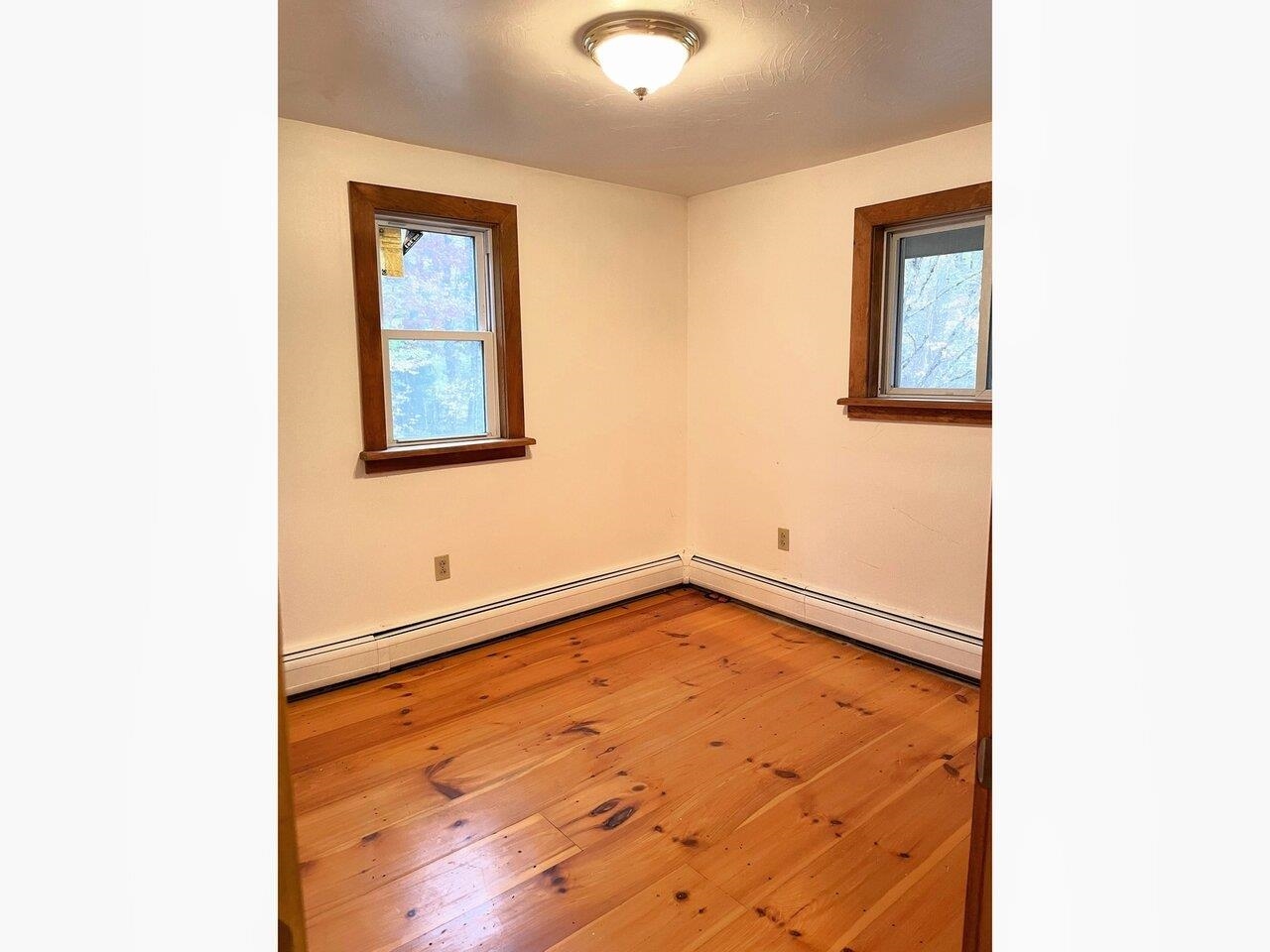 3rd bedroom w/pine flooring