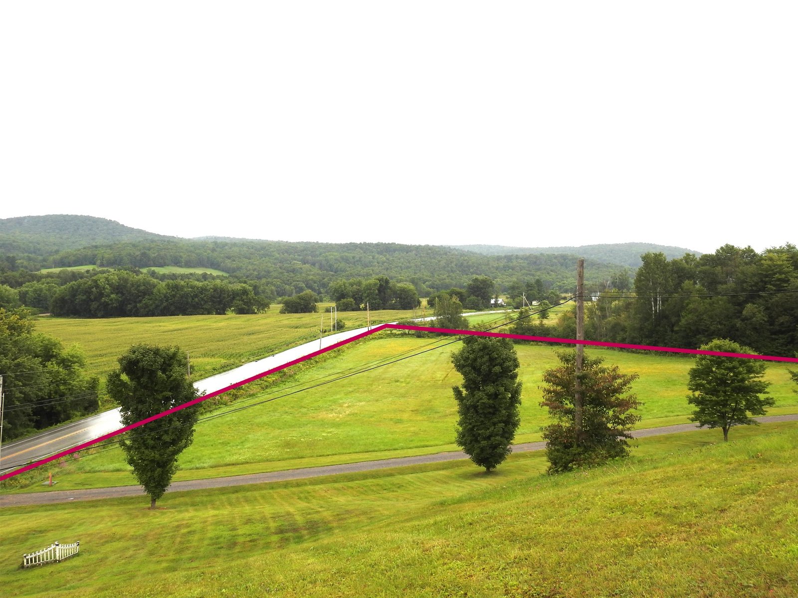 View of acreage with property lines in red