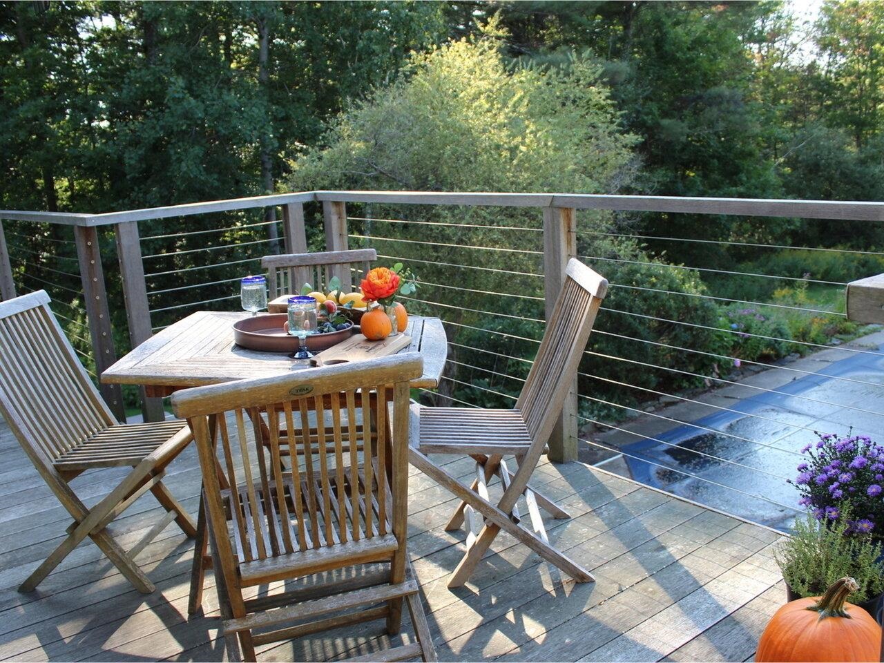 Back deck overlooks pool