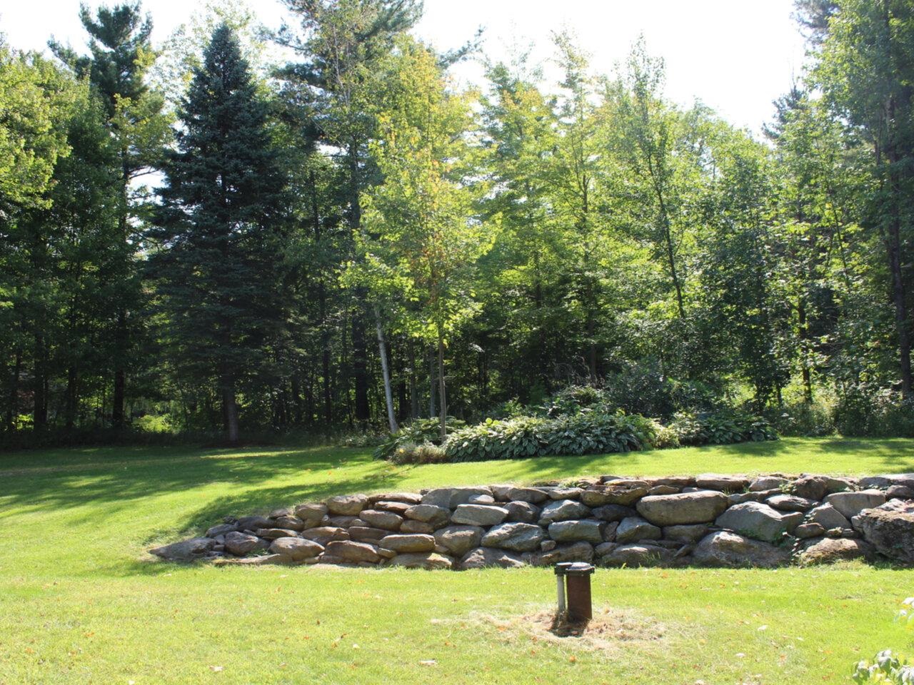 Stone walls accent grounds