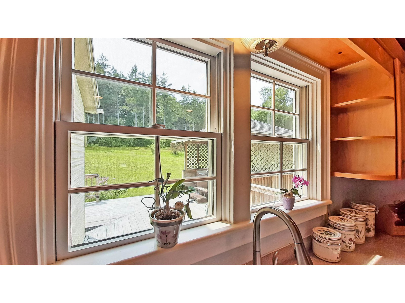 Window Overlooks Back Deck and Yard