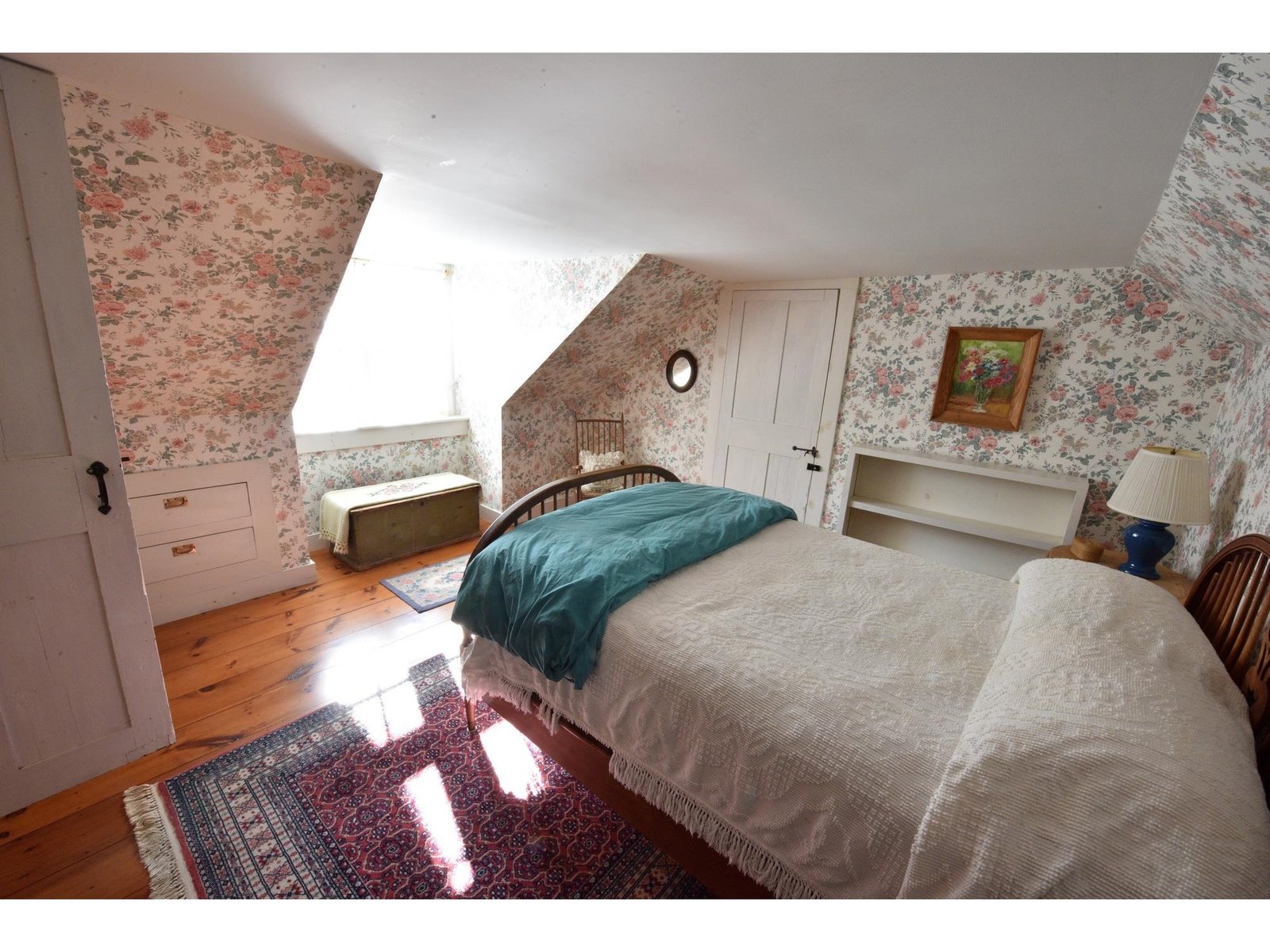 One of two second floor bedrooms