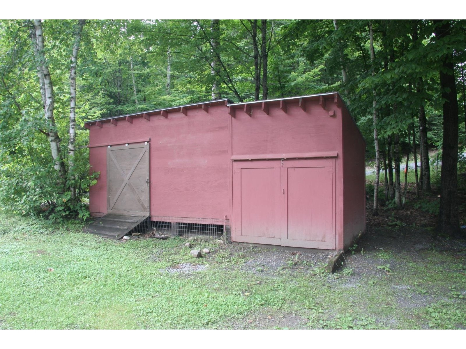 Storage shed by garage