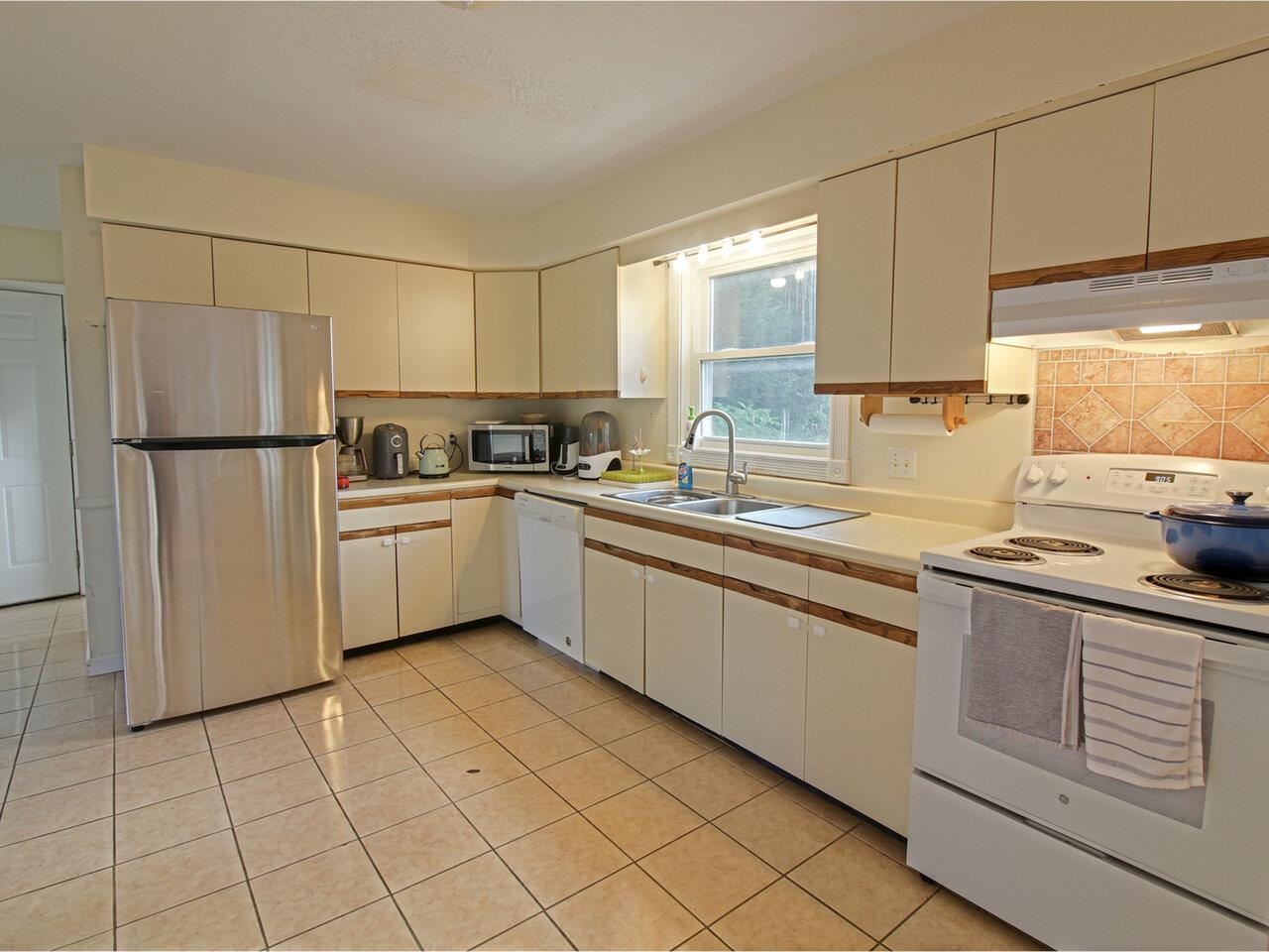 Kitchen with Stainless Fridge