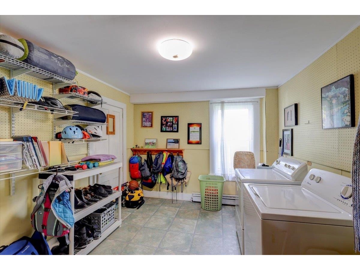 Laundry room located right off the entryway.