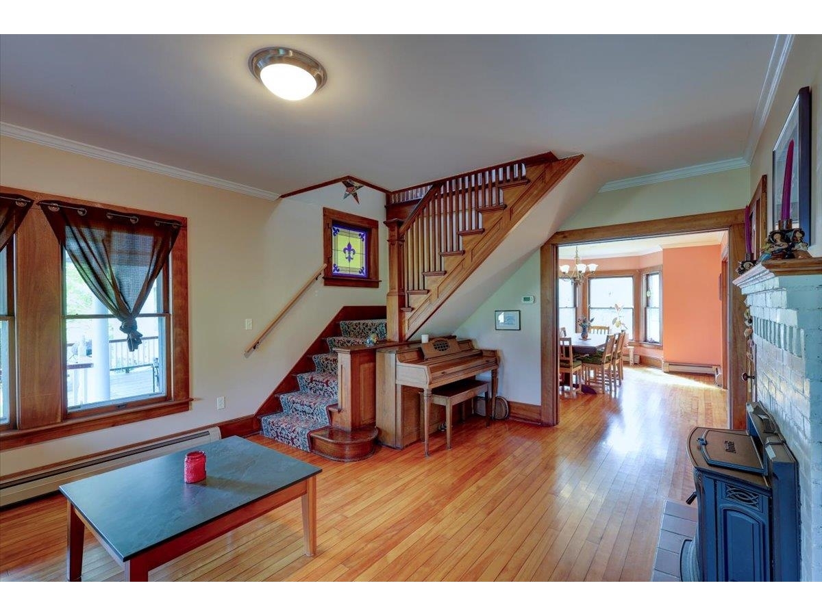 Family room with pellet stove insert.