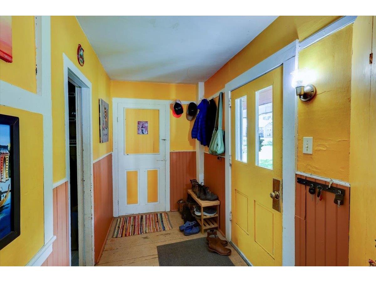 Entry way leading to mudroom, laundry room and kitchen