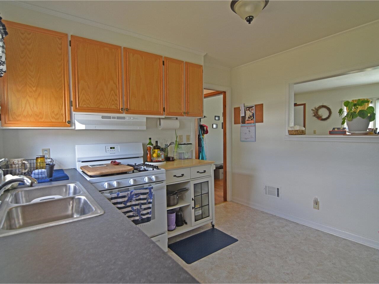 Kitchen with newer gas stove