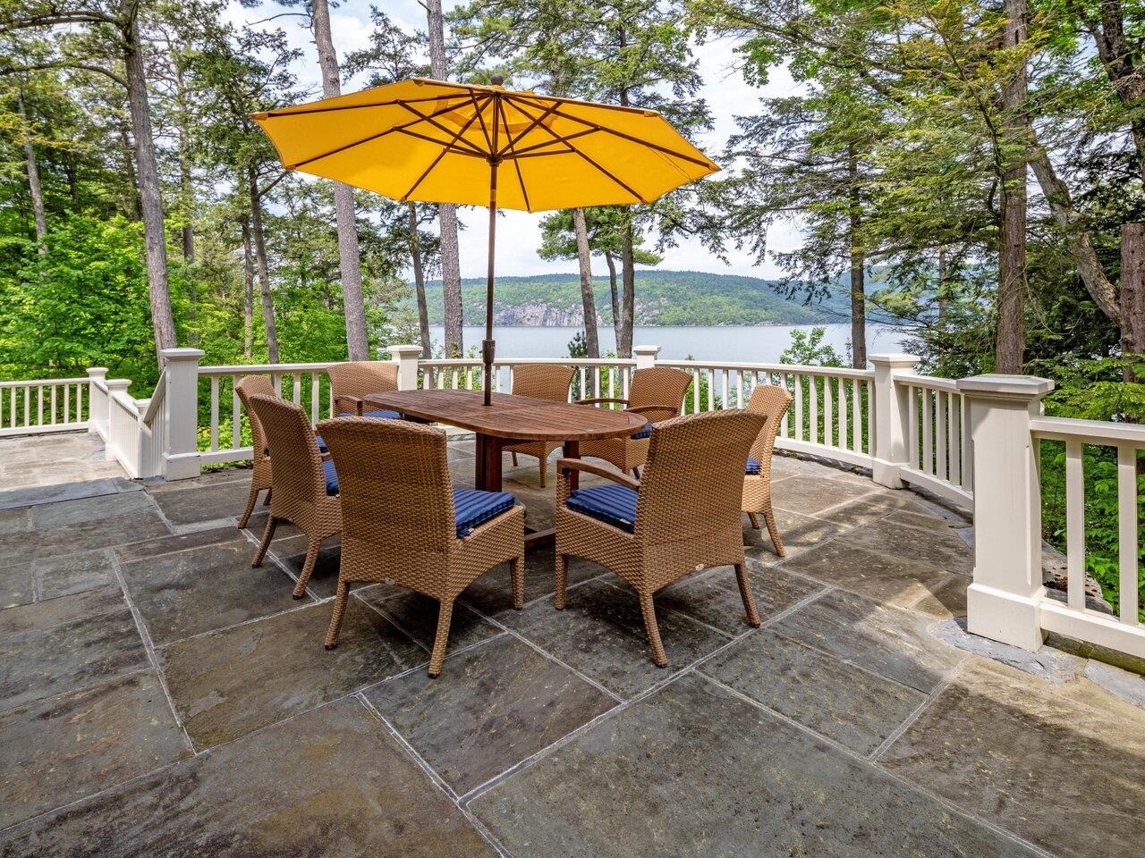 Upper stone patio w/lake views