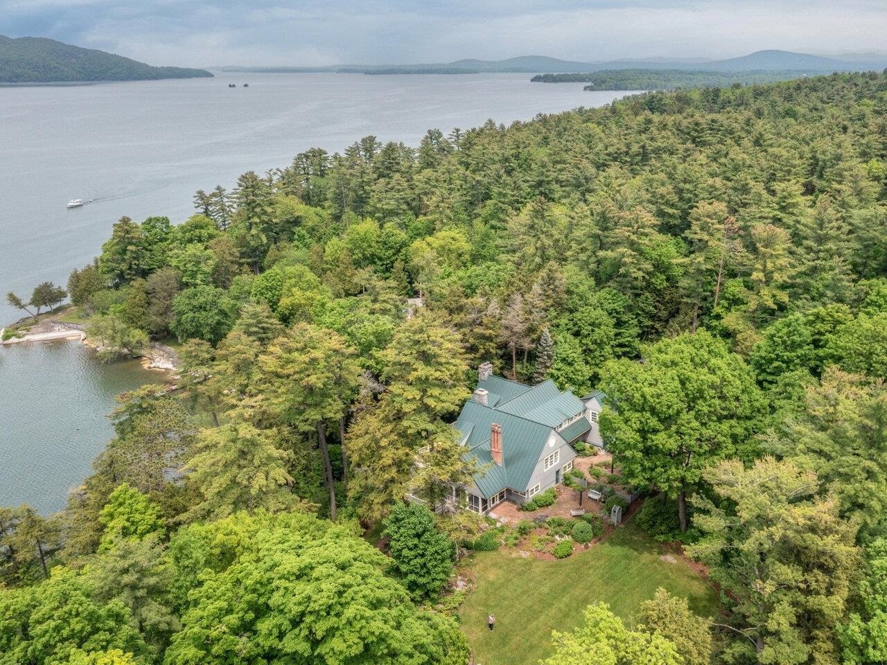 Stunning lakefront 5 ac estate