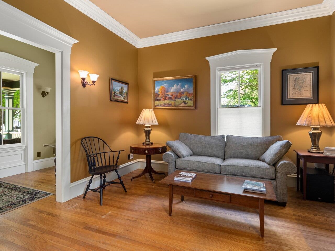 Rich wood floors in living rm