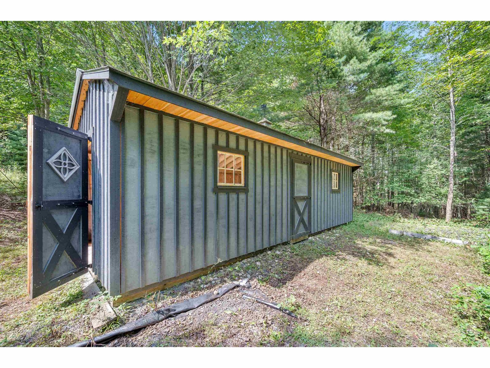 back of cabin and compost toilet room