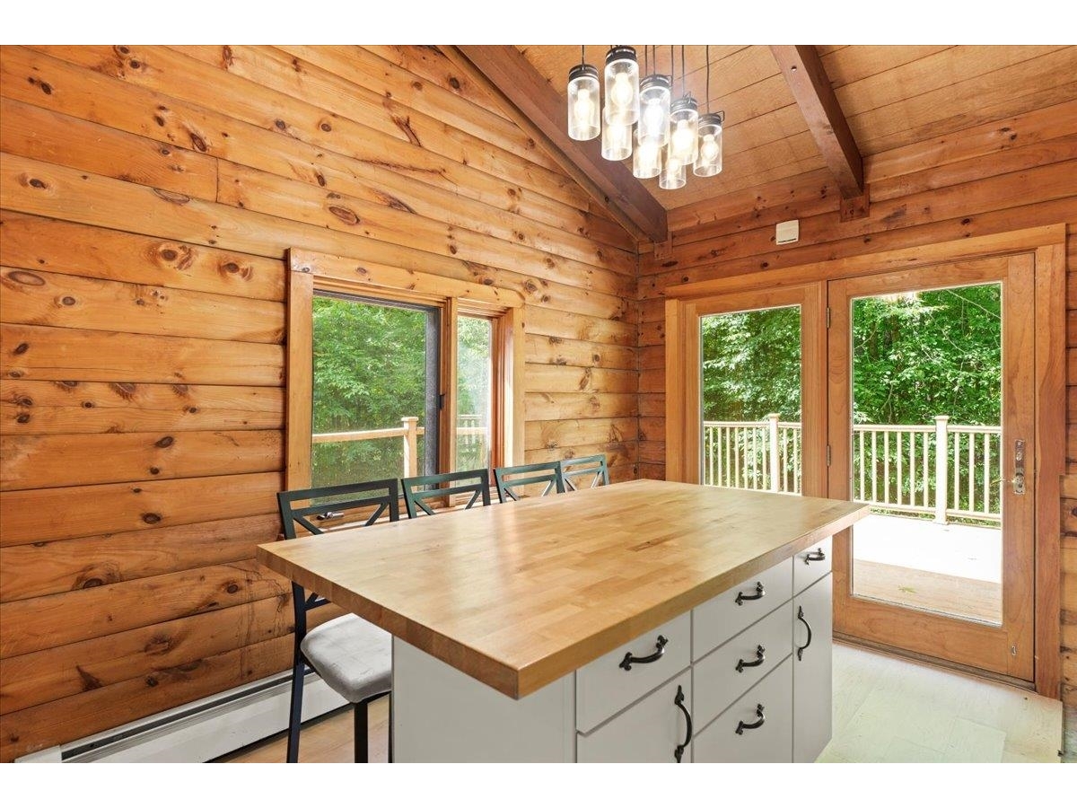 Kitchen island and french doors to the deck