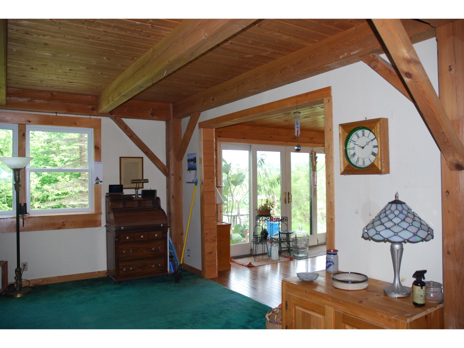 Living/Dining open to Sunroom.