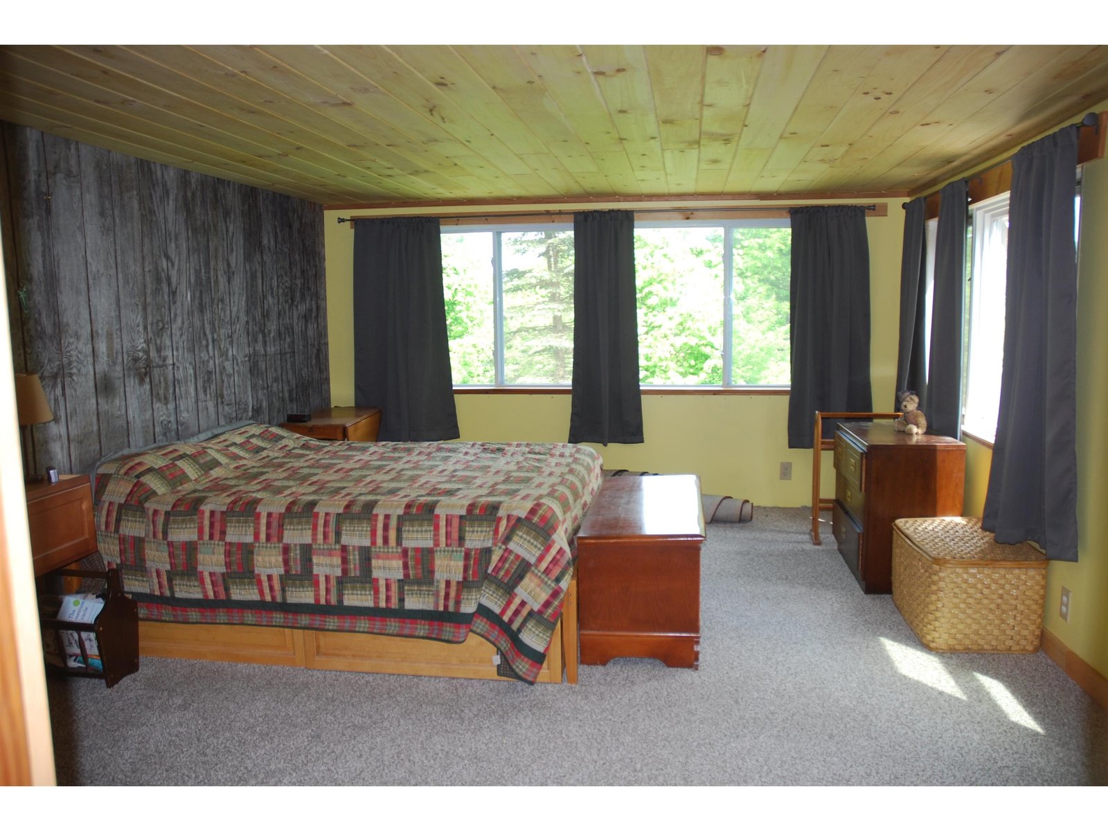 Primary bedroom w/ views of Mount Mansfield.