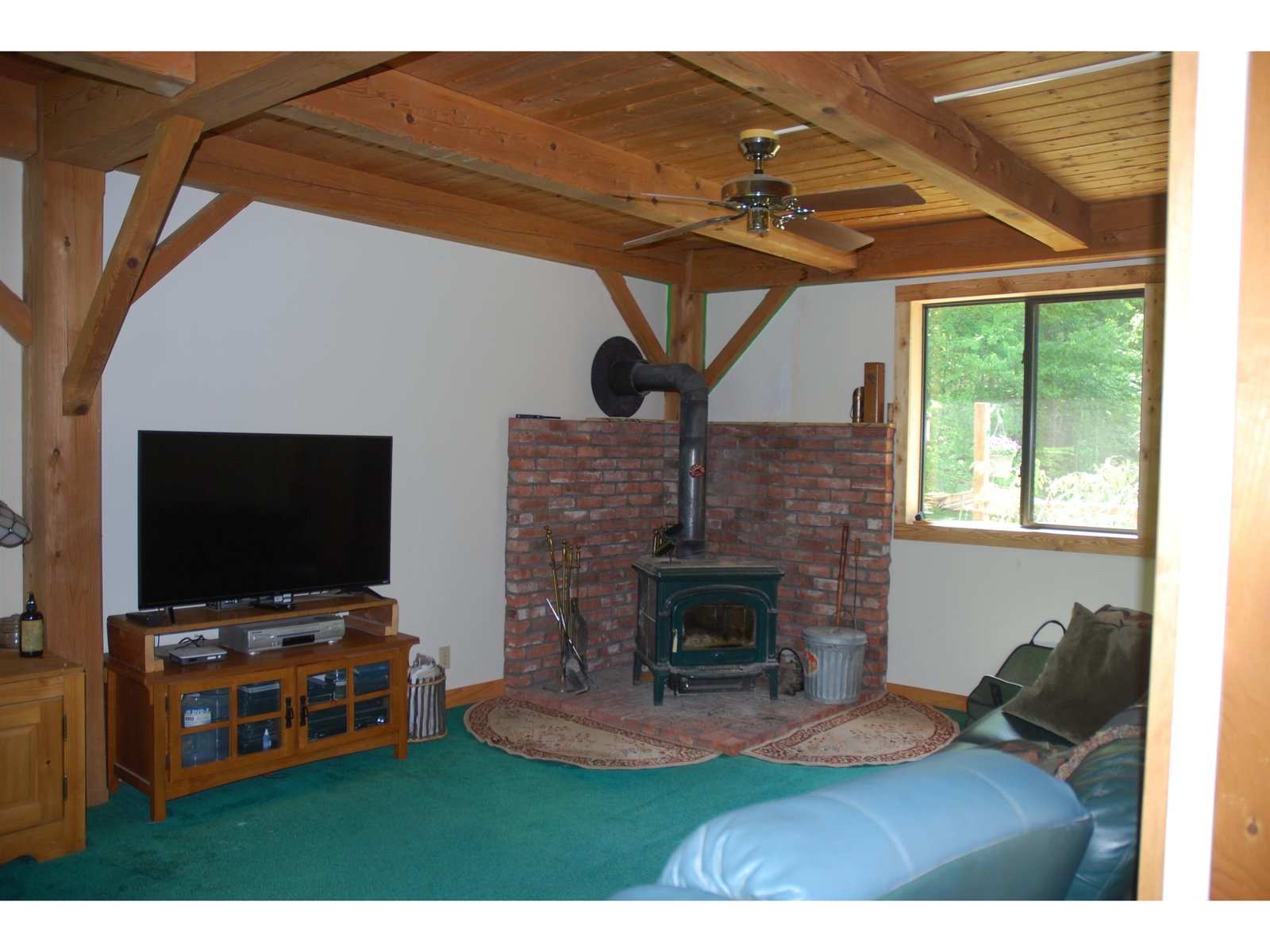 Living room w/ Hearthstone woodstove.