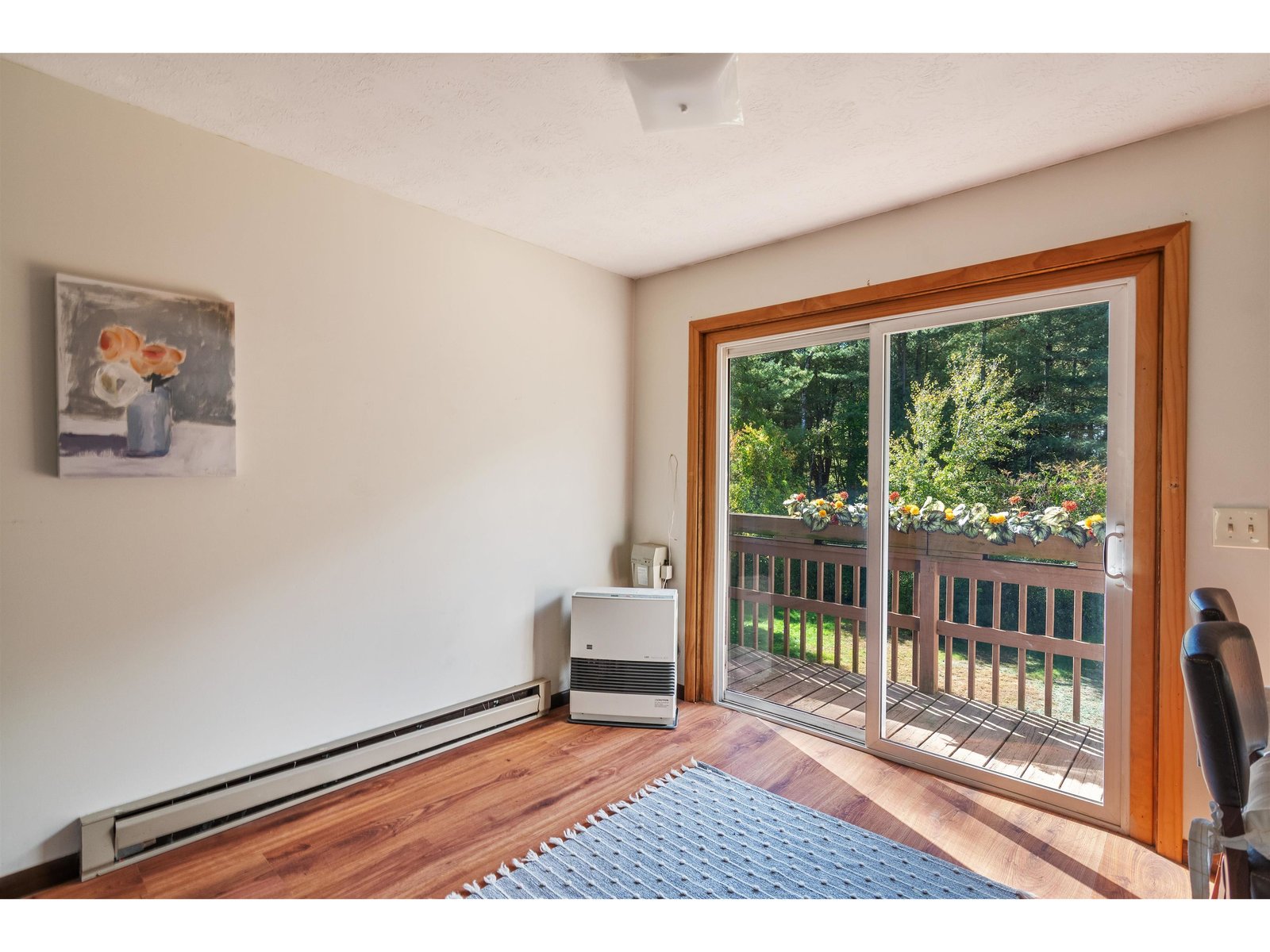 slider to balcony with planters built onto railing