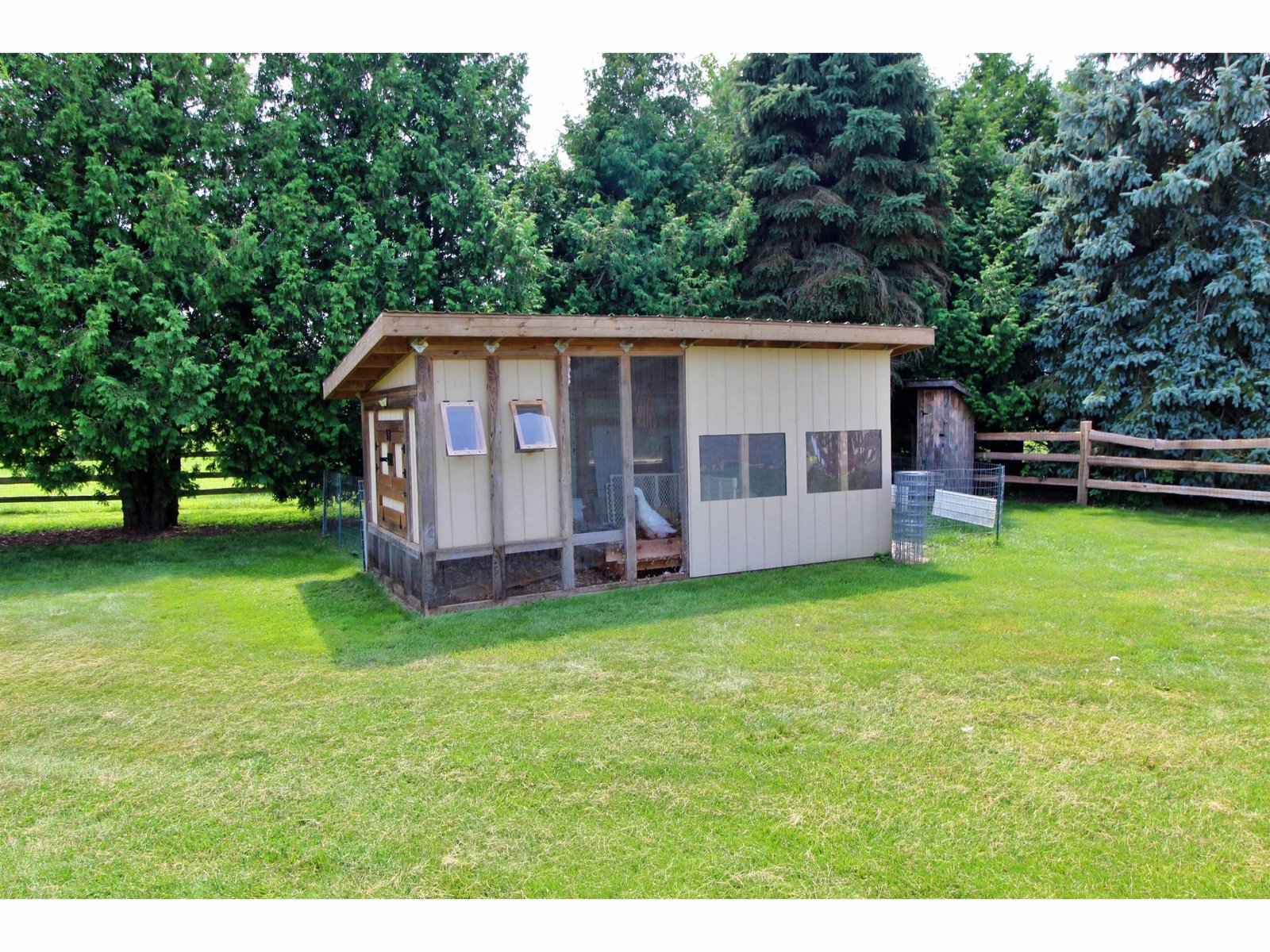 Large shop with two 10’ covered porch areas