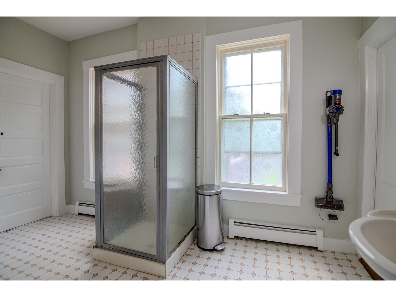 Main level shower with laundry