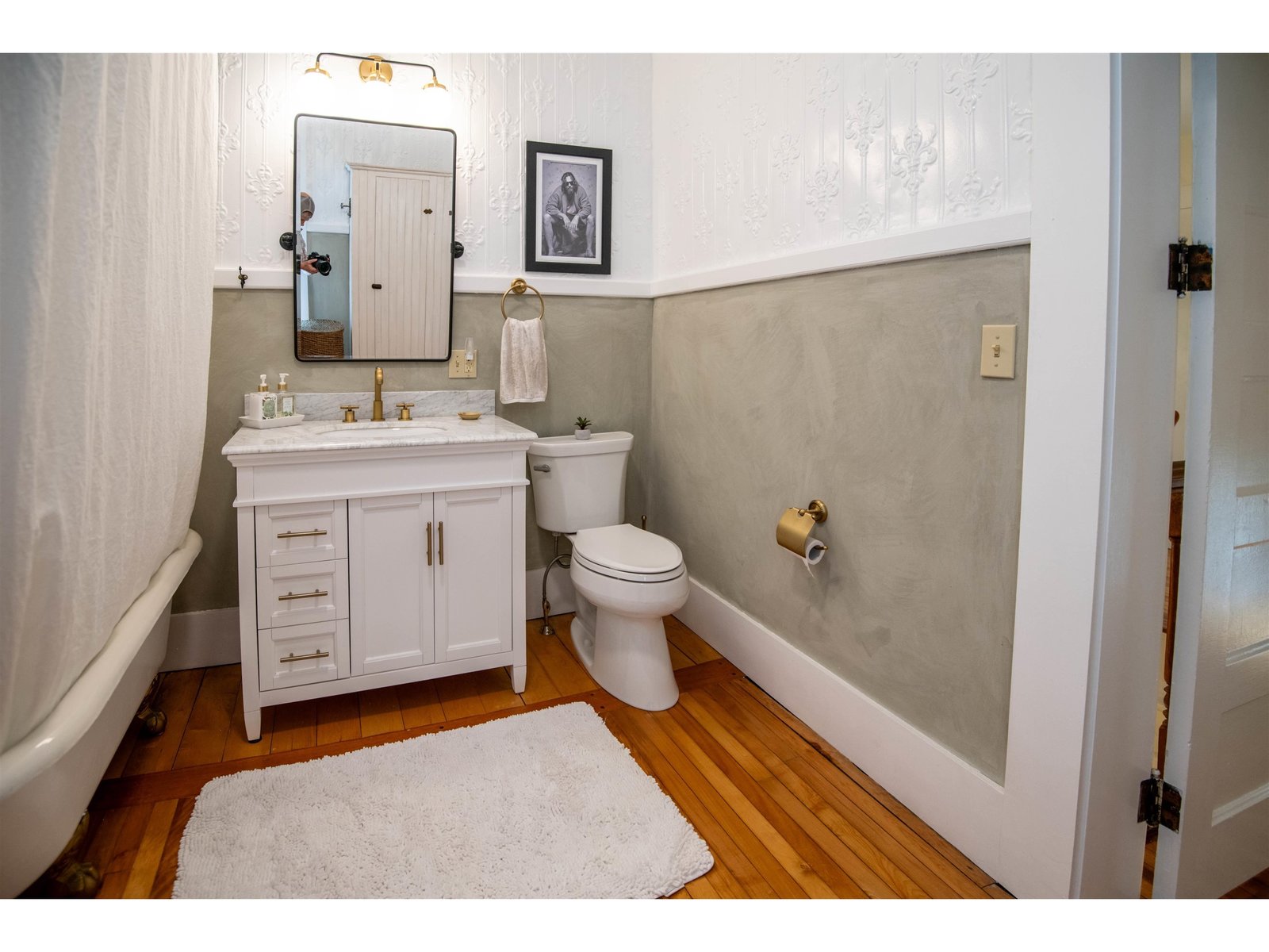 Upstairs shared bath with clawfoot tub