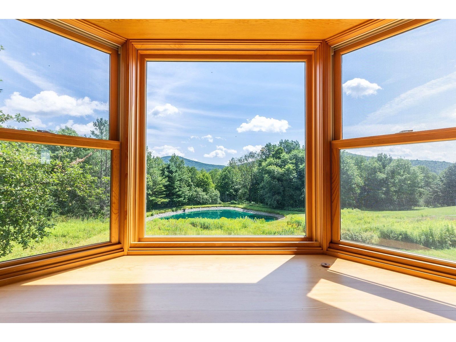 Special main bedroom suite added in 2016 that has wonderful views of the mountains and the pond