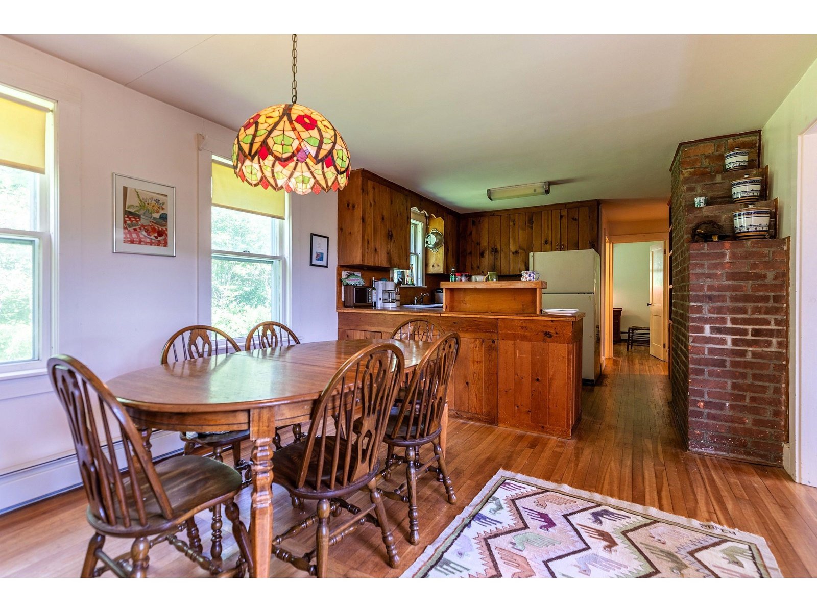 Primary bedroom suite addition added overlooking the back yard , pond and mountains.