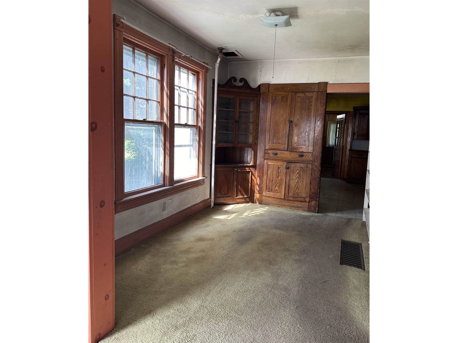 Dining room with beautiful wooden built in cabinets