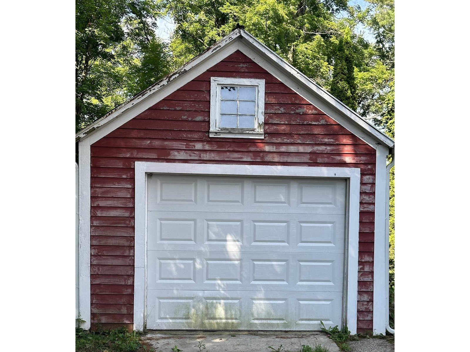 One car garage with additional room in back