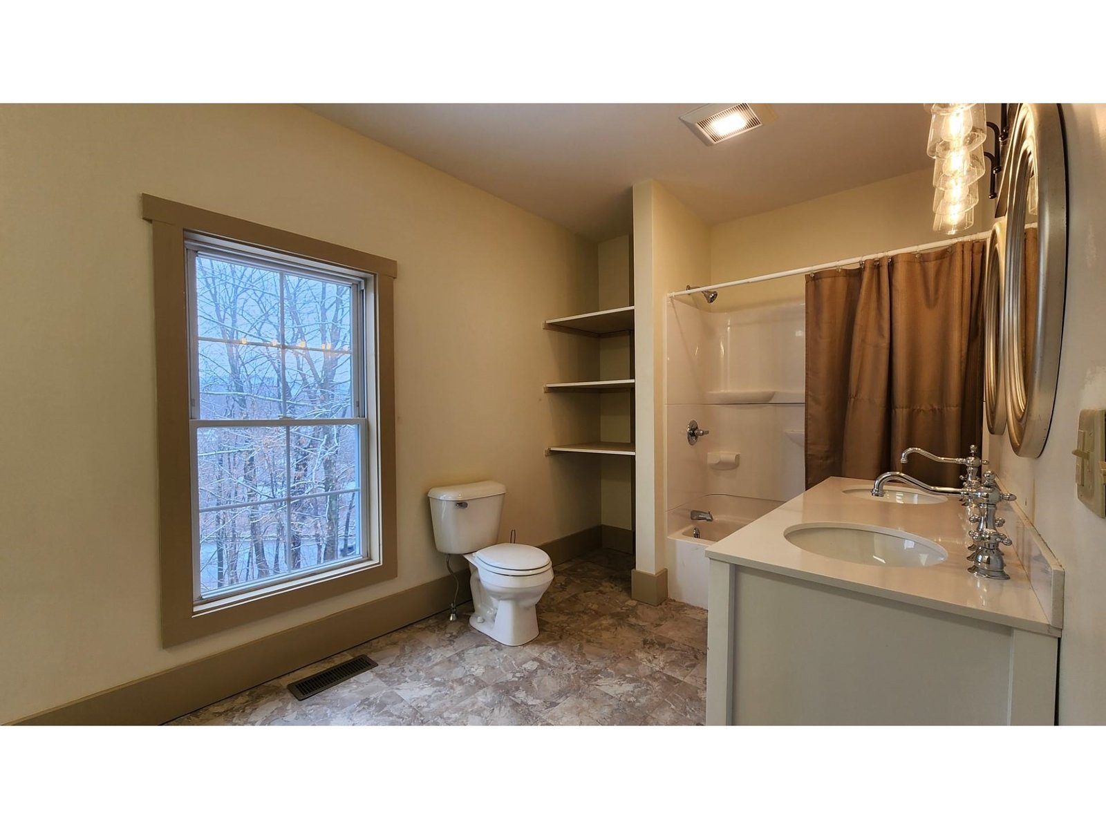 Large upstairs bathroom with laundry