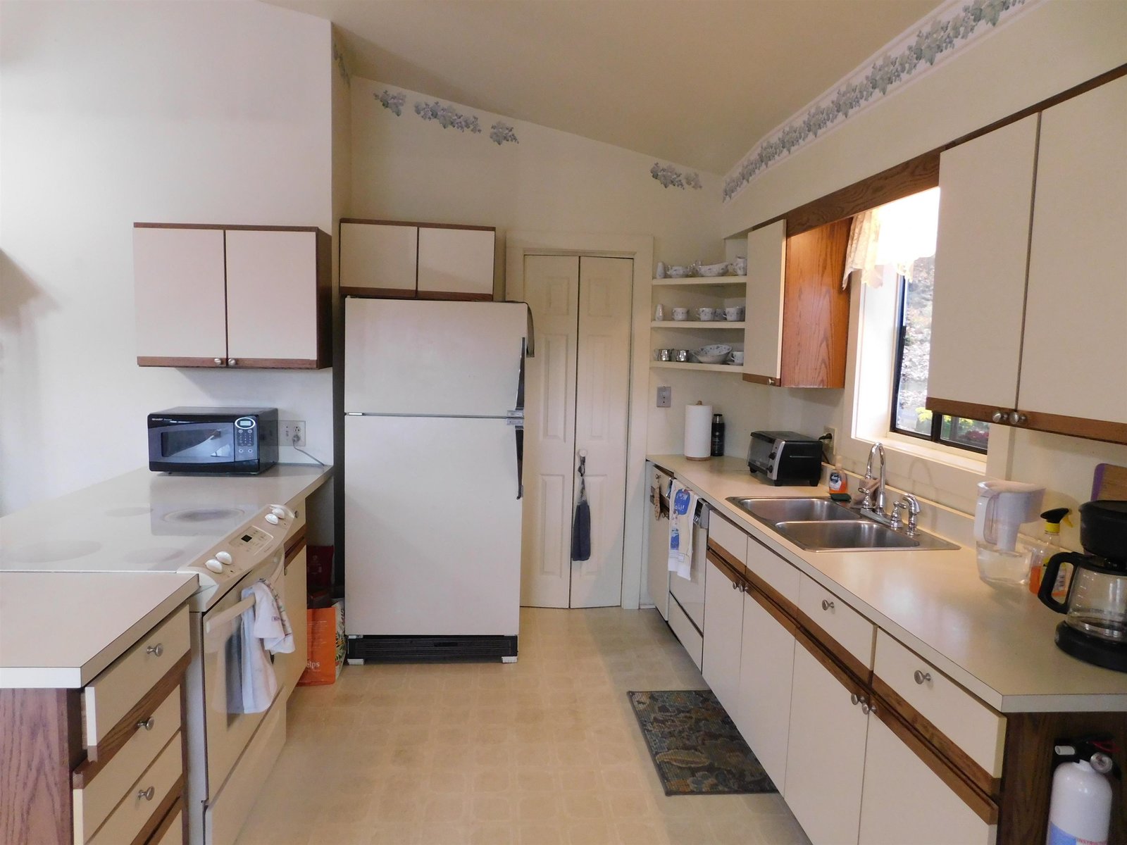 Kitchen with walk in pantry.