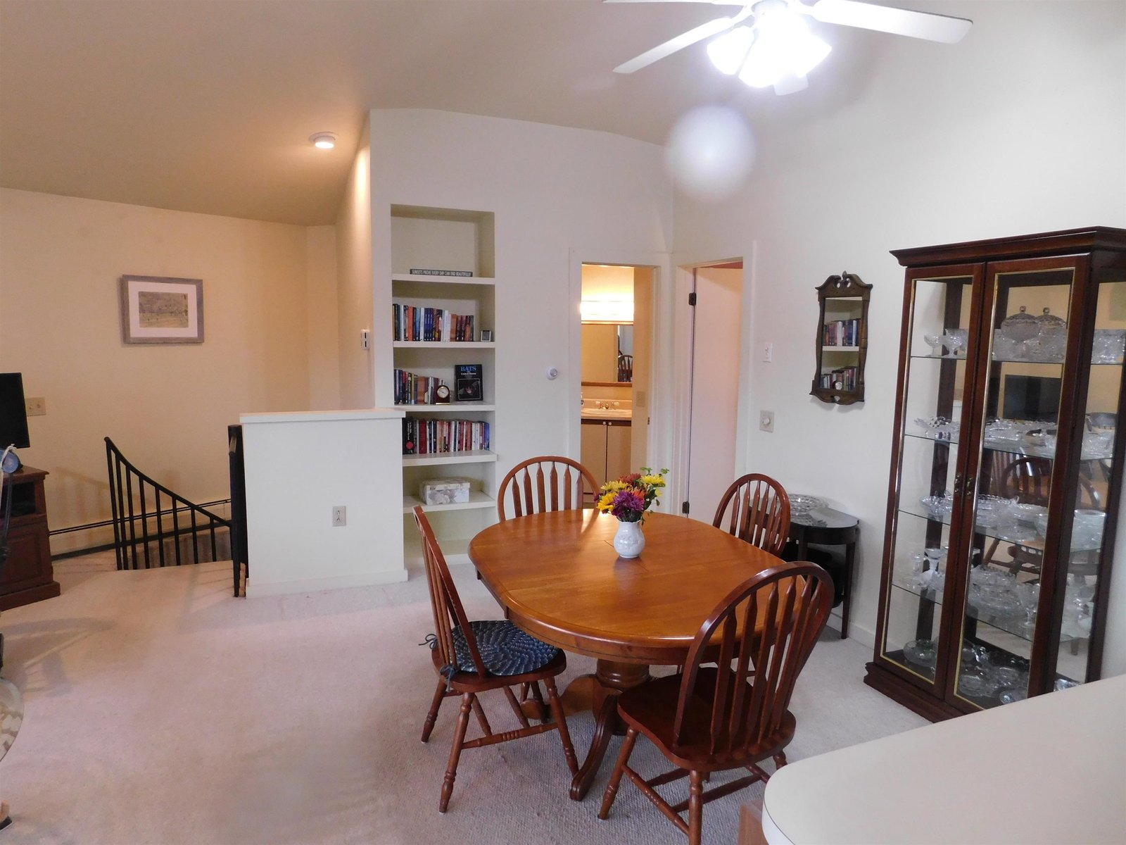 Photo showing the dining area with primary bedroom to the right.