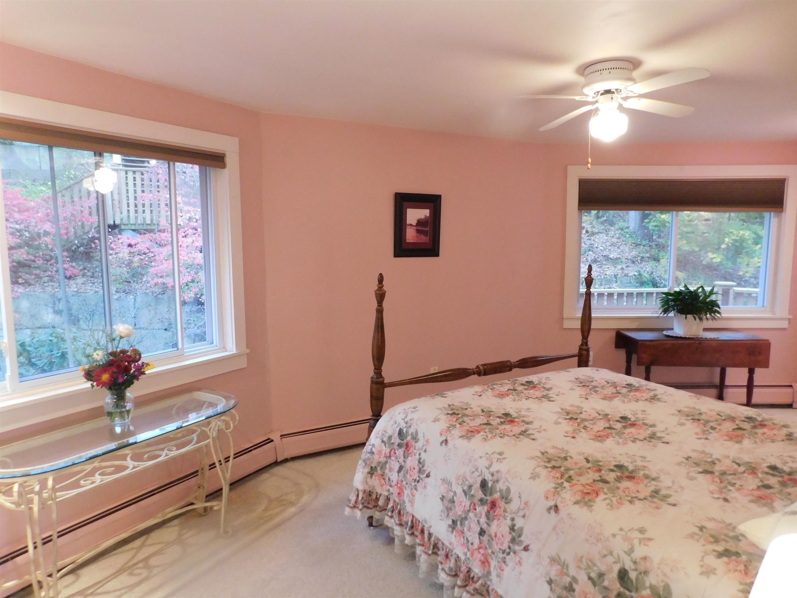 Main level primary bedroom with courtyard views.