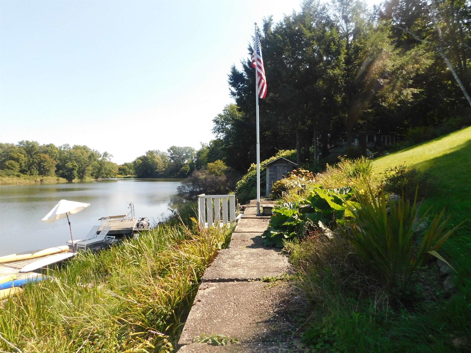 Concrete bulkhead protects the shoreline.